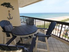 Sunrise beach views with beach access, pool, clubhouse, and garage parking