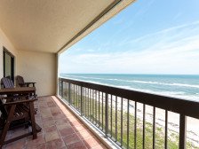 Coastal condo with direct oceanfront views and pool access!