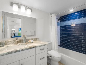 Modern and attractive tile work in guest bathroom
