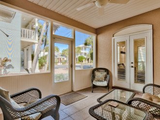 Enclosed porch area for morning coffee! Opens up to the living area.