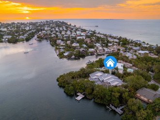 Waterfront home includes Private Boat Dock, Golf Cart, Heated Pool and Mother #1