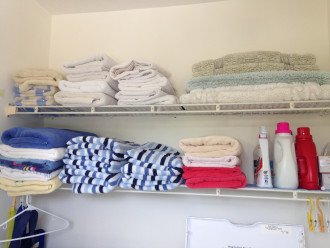 Laundry Room shelves with beach towels and car/boat towels