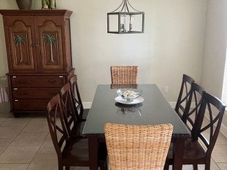 Dining table with seating for 8. Plus bonus pantry cabinet
