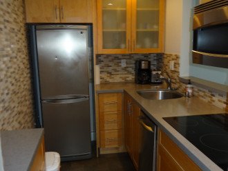 Condo #4 Kitchen featuring Stainless appliances; dishwasher and oven/micro