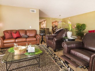 Sit Back and Relax on the Leather Couch and Recliners.