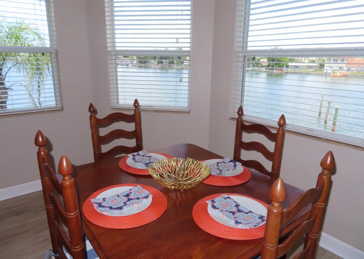 Dining Room Table and Chairs - set for 4 with leaves will seat 8 comfortably.
