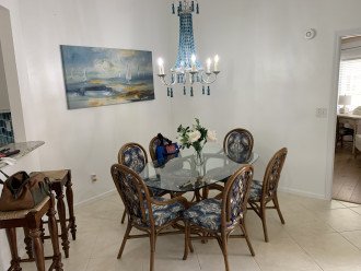 Dining room with seating for six plus two extra bar stools