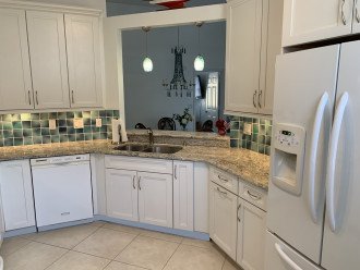 High-end kitchen with granite counter tops and lots of storage