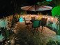 Outdoor lighting and seating for 4 on back patio