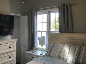 Second Queen Bedroom with Smart TV, chest of drawers/nightstand and closet