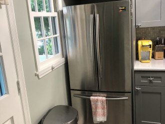 Extra large refrigerator with pullout freezer with ice maker