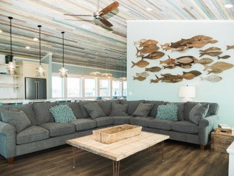 Living room with beautiful reclaimed beadboard ceiling