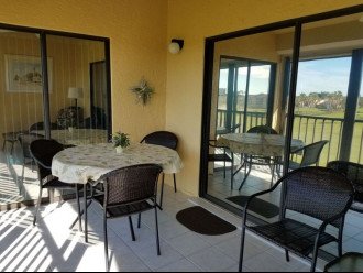 Private screened Lanai,nicely furnished 'bonus room' great for dining & lounging