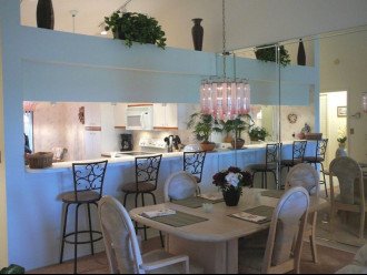 Diningroom, plenty of counter seating,xtra table leaf & chairs,cathedral ceiling