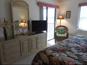 Master Suite has Lanai entrance & large window view of golf course/sunsets