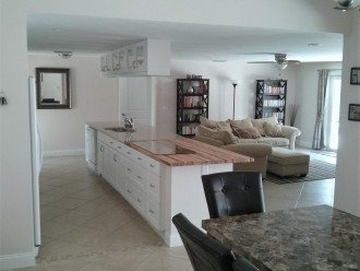Enjoy the Florida sunshine! Large pool area to dine, entertain or just chill. #1
