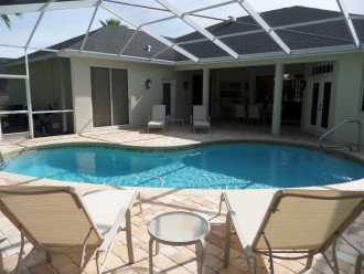 Large pool area with all new patio loungers and chairs