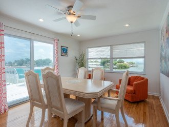 Lg dining area w/ water views & sliders to private patio(chairs replaced w/sofa)