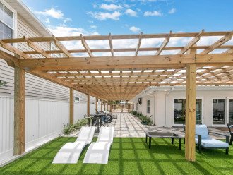 Enjoy This Modern Zen Inspired Backyard with Corn Hole & Large Summer Kitchen