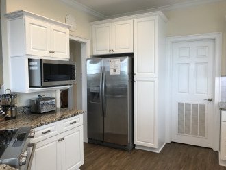 Kitchen with door to laundry room