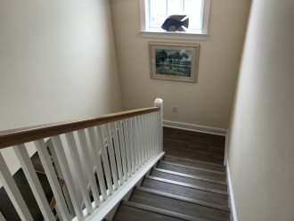 Stairs between main floor and top floor