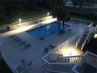 Pool in the evening hours with outdoor lighting
