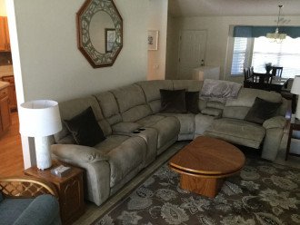 The comfortable couch has two powered built in recliners on each end.
