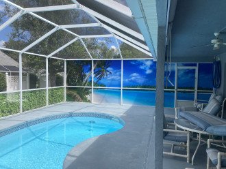 Beautiful 3/2 House with large screened in heated Pool with beach mural #1