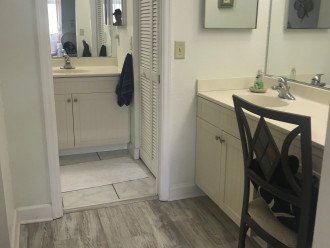 Master bath with dressing table on the right with 2nd sink.