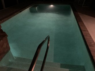 Nothing beats relaxing in a lit pool and spa on a starry night.