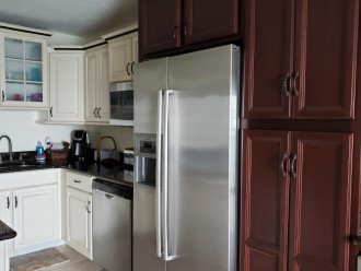 Kitchen:full size refrigerator/ice maker, dishwasher,microwave/convection ovenov