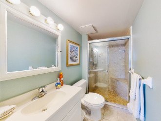 Master bathroom with built in bench seat in the shower.