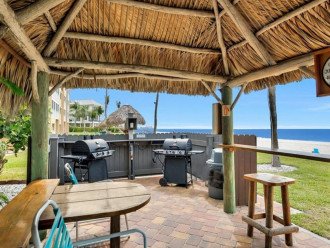 There are 4 Gas grills for your use under the tiki hut right on the beach