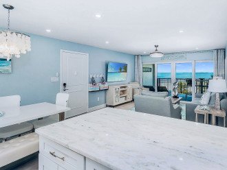 Spacious kitchen and great room with views of the beach and Gulf of Mexico.