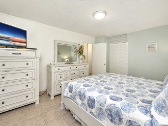Ocean Jewels Oceanfront 1 Bedroom - bedroom with king bed en suite bathroom