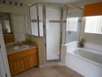 Bathroom with shower and bath