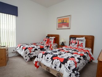 Twin room with two single beds and TV