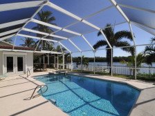 Banana River Beauty - Five Bedroom Waterfront Home with Heated Pool and Spa