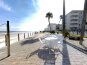Sundeck with tables, chairs and lounge chairs