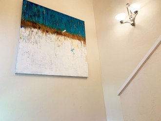 Custom art from local artists are throughout the house.