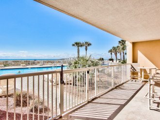 Patio that walks out to pools, hot tubs, and boardwalk to the beach!