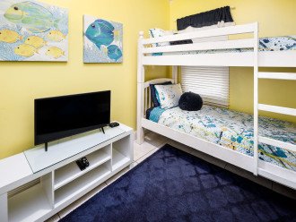 The kids love the fun bunk bedroom with their own TV!