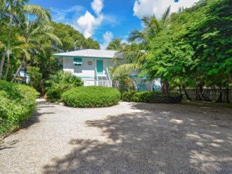 Lush tropical plantings in a gated compound located directly on the Florida Bay #1