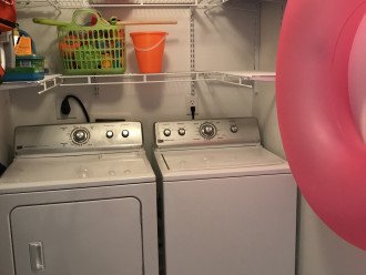 Full size washer and dryer with lots of kid toys