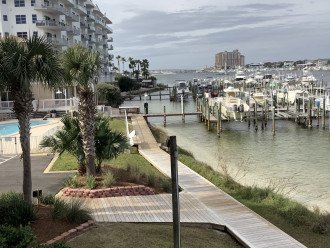 View from balcony of pool and docks