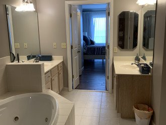 His/her vanities view from huge bathroom. His/her closets