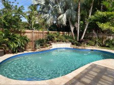 Tropical Escape w/ heated pool, 5 min to beach/downtown!