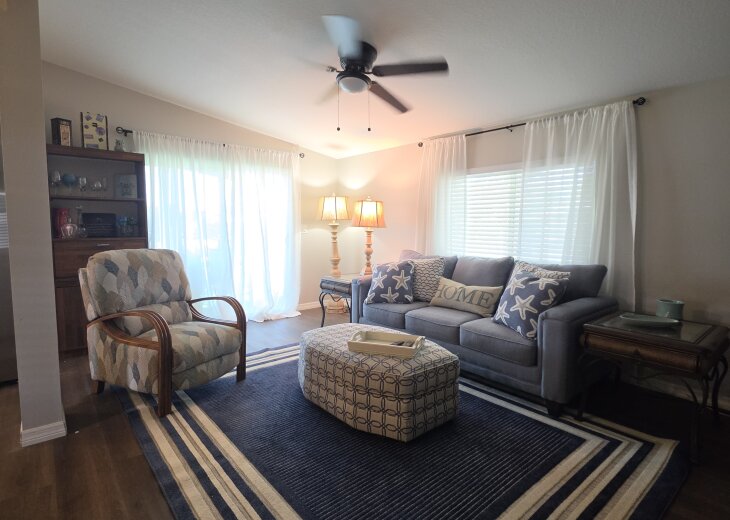 Living Room with Recliner and New Sofa Bed