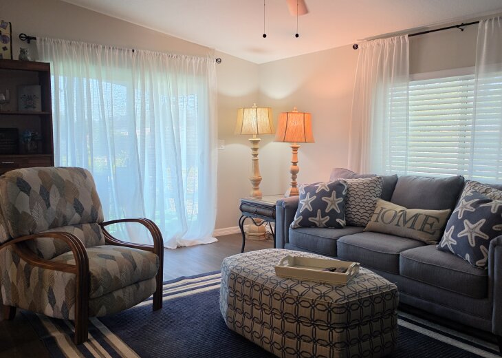 Living Room Opens to Spacious Screened Porch