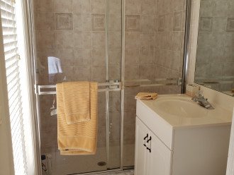 walk-in tiled shower --- bonus has direct pool access from queen master